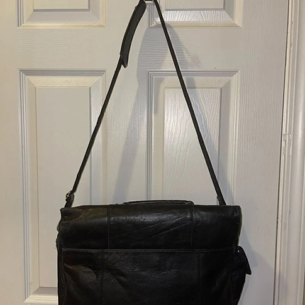 Wilson leather Black Leather Briefcase laptop Nylon side silver tone hardwares.